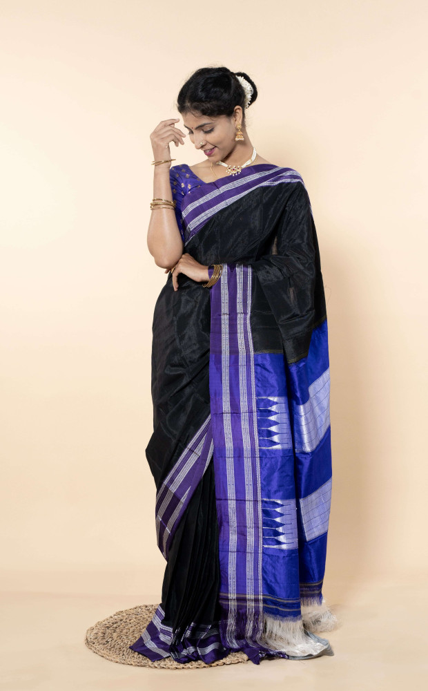 Lustrous Ocean Blue Silk Saree Adorned With Elegant White Accents