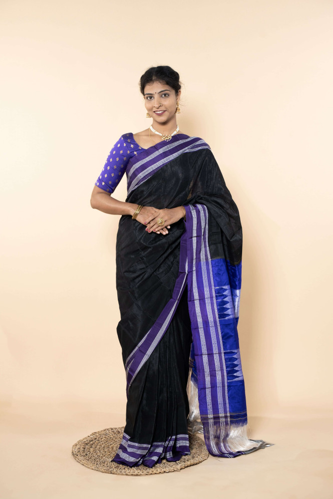 Lustrous Ocean Blue Silk Saree Adorned With Elegant White Accents